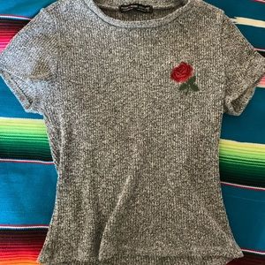 beautiful gray shirt with rose on the side